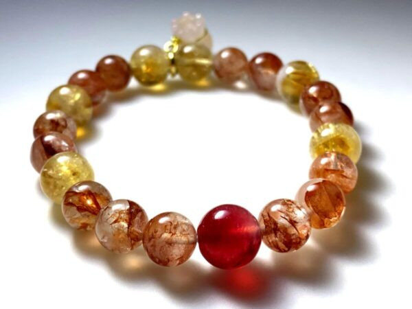 Citrine red gum flower crystal and strawberry quartz bracelet